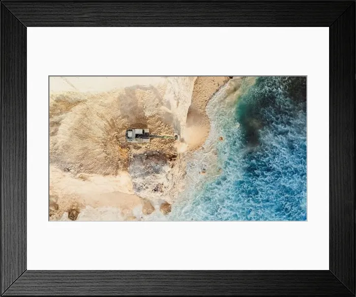 Framed Print : The work of escalators and the destroying of the cliff in Uluwatu, Bali. Aerial drone view Framed Print : The work of escalators and the destroying of the cliff in Uluwatu, Bali. Aerial drone view