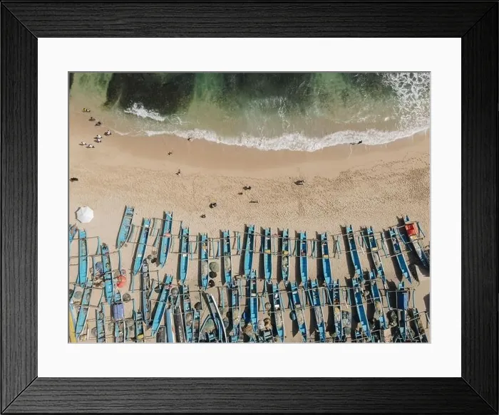 Framed Print : Top view of Drini Beach in Gunungkidul, Yogyakarta, Indonesia with many blue boats on the sand Framed Print : Top view of Drini Beach in Gunungkidul, Yogyakarta, Indonesia with many blue boats on the sand