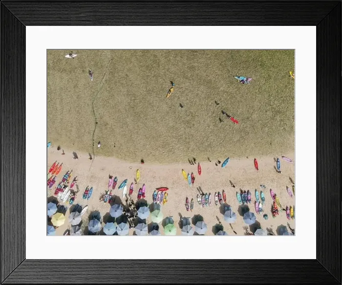 Framed Print : Top view of Drini Beach in Gunungkidul, Yogyakarta, Indonesia with many people and many colorful surfboards Framed Print : Top view of Drini Beach in Gunungkidul, Yogyakarta, Indonesia with many people and many colorful surfboards