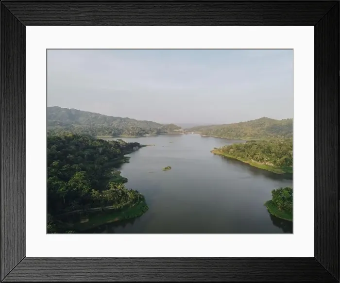 Framed Print : Top aerial view landscape of clear lake named Sermo lake on a bright day in Kulonprogo, Yogyakarta, Indonesia Framed Print : Top aerial view landscape of clear lake named Sermo lake on a bright day in Kulonprogo, Yogyakarta, Indonesia