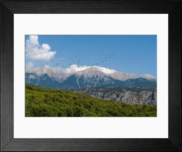 Framed Print : The White Mountains (Ak daglar) with birds in a blue sky background. Antalya, Turkey