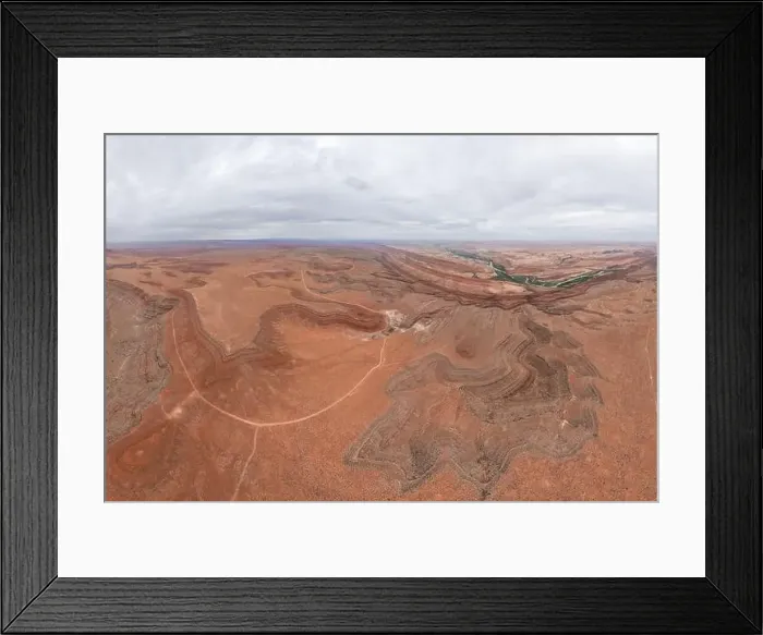 Framed Print : Drone view of meandering Rio San Juan cutting through the rugged landscapes of San Juan Canyon near Mexican Hat