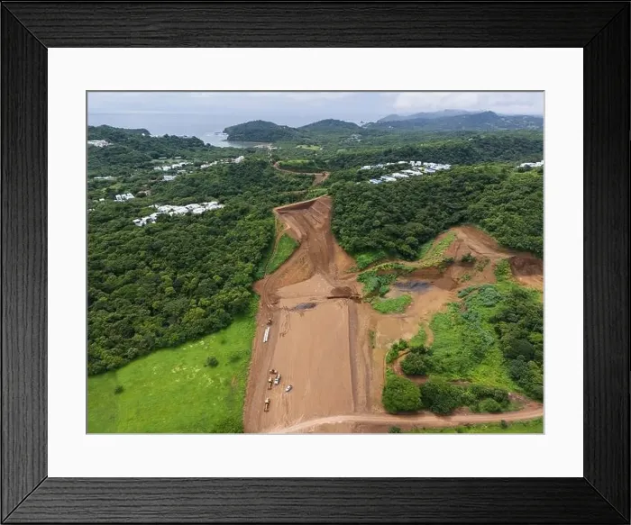 Framed Print : Preparing to build road in green hill jungle aerial drone view Framed Print : Preparing to build road in green hill jungle aerial drone view