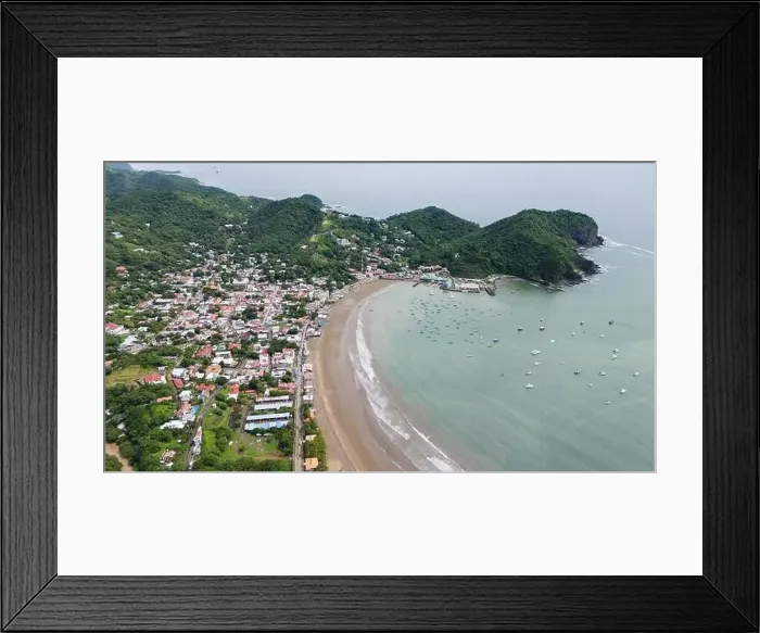 Framed Print : Port pier in bay San juan Del Sur town panorama aerial drone view Framed Print : Port pier in bay San juan Del Sur town panorama aerial drone view