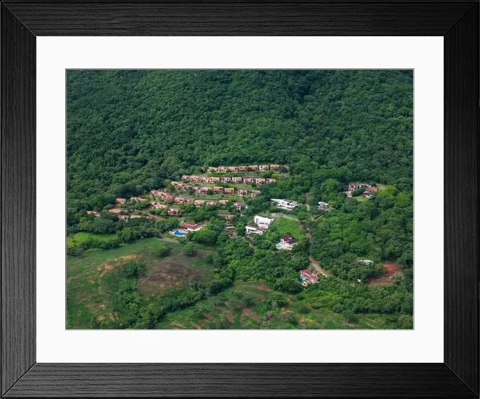 Framed Print : Residential with pool in green hill background aerial drone view Framed Print : Residential with pool in green hill background aerial drone view