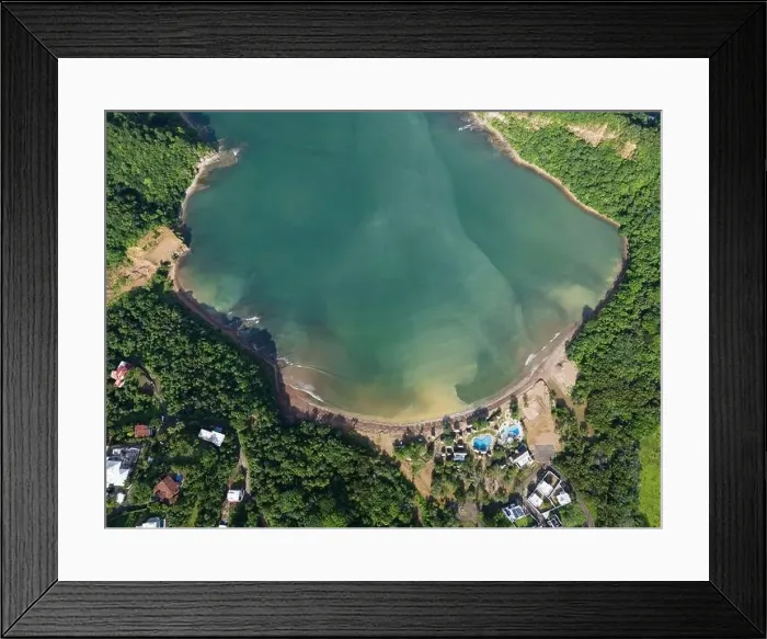 Framed Print : Green ocean bay with hotel resort with pool above top view