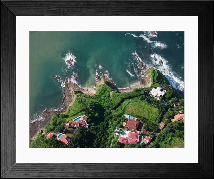 Framed Print : Luxury villas on green tropical waterfront above top drone view Framed Print : Luxury villas on green tropical waterfront above top drone view