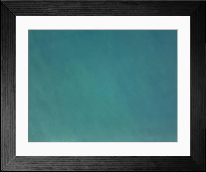 Framed Print : Green tropical sea water with small waves above top drone view Framed Print : Green tropical sea water with small waves above top drone view