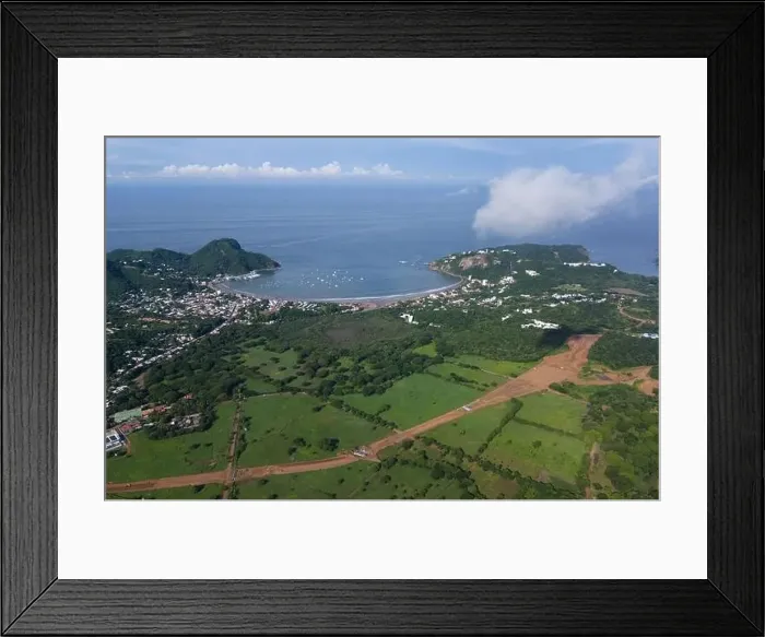 Framed Print : Building new road near San Juan Del Sur in Nicaragua aerial drone view