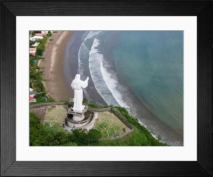 Framed Print : Jesus christ statue monument on green sea background aerial drone view Framed Print : Jesus christ statue monument on green sea background aerial drone view