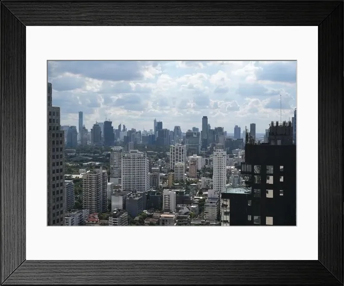 Framed Print : Aerial view of the skyline of Thai capital on a summer day with clouds Framed Print : Aerial view of the skyline of Thai capital on a summer day with clouds