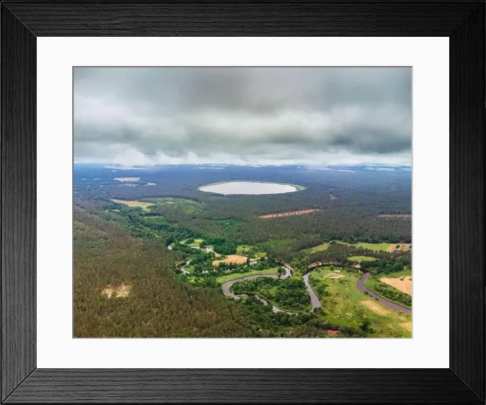 Framed Print : Aerial view of the lake and river in the forest. River Merkys and lake Glebo, Lithuania, Varena district Framed Print : Aerial view of the lake and river in the forest. River Merkys and lake Glebo, Lithuania, Varena district