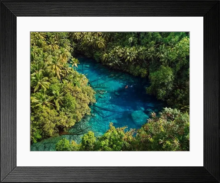 Framed Print : Tropical transparent lake with crystal blue fresh water in Sulawesi, Indonesia. Aerial view Framed Print : Tropical transparent lake with crystal blue fresh water in Sulawesi, Indonesia. Aerial view