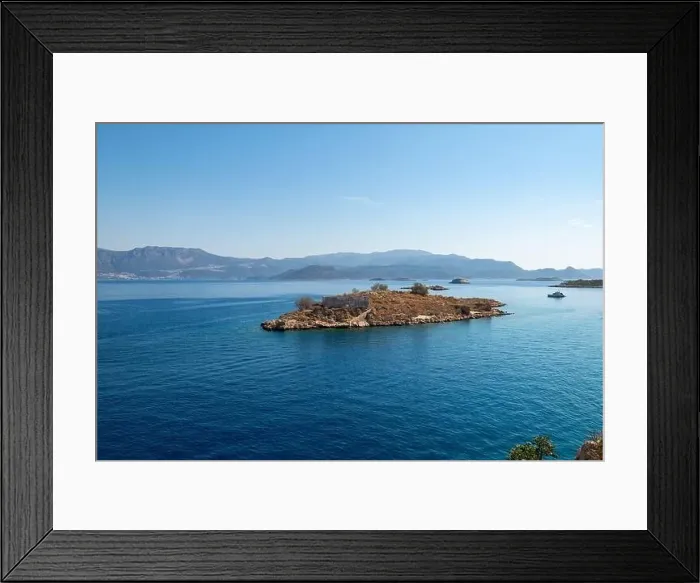 Framed Print : Clear, turquoise blue sea and small islands in the Aegean. The Greek island of Kastellorizo Framed Print : Clear, turquoise blue sea and small islands in the Aegean. The Greek island of Kastellorizo