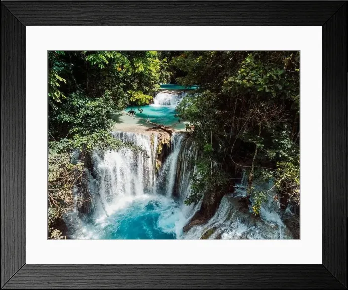 Framed Print : Scenic cascade waterfall with natural blue water in Central Sulawesi, drone view Framed Print : Scenic cascade waterfall with natural blue water in Central Sulawesi, drone view