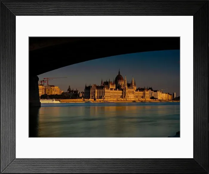 Framed Print : Budapest, Hungary - August 06, 2024: Parliament building during golden hour Framed Print : Budapest, Hungary - August 06, 2024: Parliament building during golden hour