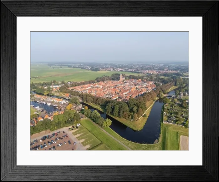 Framed Print : Aerial drone photo of the small city named Elburg. Elburg is a fortified town with a lot of history in the Netherlands Framed Print : Aerial drone photo of the small city named Elburg. Elburg is a fortified town with a lot of history in the Netherlands