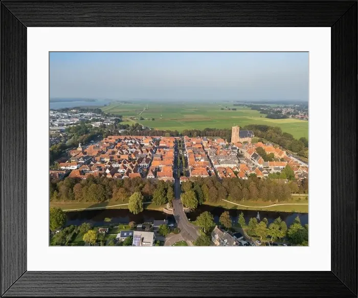 Framed Print : Aerial drone photo of the small city named Elburg. Elburg is a fortified town with a lot of history in the Netherlands Framed Print : Aerial drone photo of the small city named Elburg. Elburg is a fortified town with a lot of history in the Netherlands
