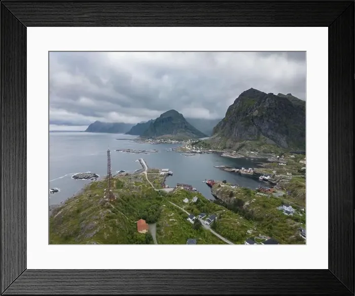 Framed Print : Sorvagen city aerial cloudy view with houses and rocky mountains, Lofoten Norway Framed Print : Sorvagen city aerial cloudy view with houses and rocky mountains, Lofoten Norway