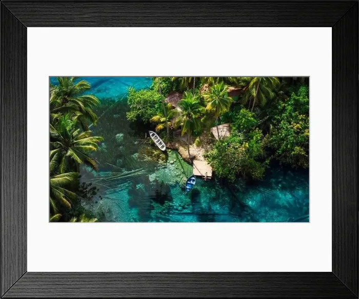 Framed Print : Woman sitting on pier in transparent lake with transparent blue water in Indonesia. Aerial view Framed Print : Woman sitting on pier in transparent lake with transparent blue water in Indonesia. Aerial view