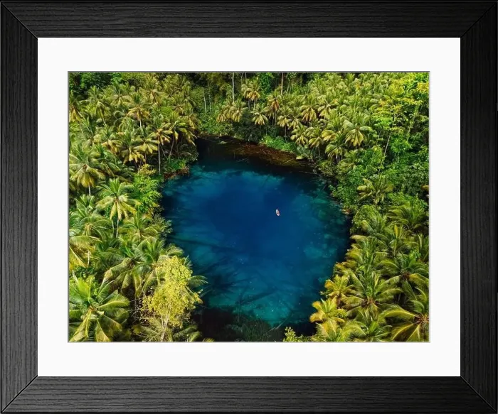Framed Print : Tropical transparent lake with crystal blue fresh water in jungle forest on Sulawesi, Indonesia. Aerial view Framed Print : Tropical transparent lake with crystal blue fresh water in jungle forest on Sulawesi, Indonesia. Aerial view