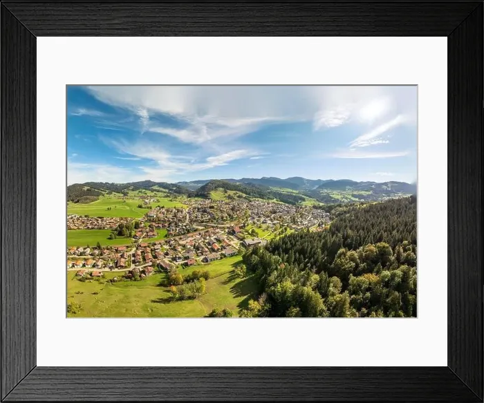 Framed Print : Aerial photo of the village of Oberstaufen in the Allgaeu Alps, Bavaria, Germany Framed Print : Aerial photo of the village of Oberstaufen in the Allgaeu Alps, Bavaria, Germany