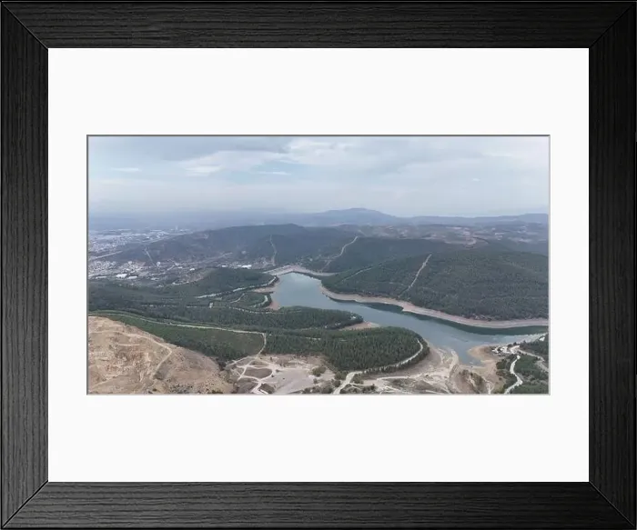 Framed Print : Aerial lake view in overcast weather covered by pine tree forest Framed Print : Aerial lake view in overcast weather covered by pine tree forest