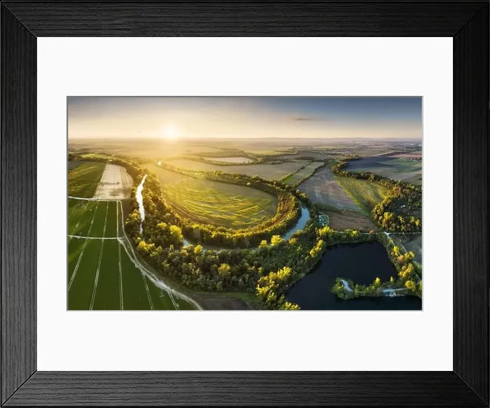 Framed Print : Sunset at Danube river meandering through romantic Slovakia countryside nature landscape Near Senec from drone Framed Print : Sunset at Danube river meandering through romantic Slovakia countryside nature landscape Near Senec from drone