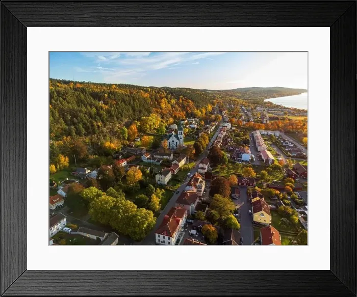 Framed Print : Gränna church in Sweden, autumn colors, at sunset, aerial view. Beautiful small swedish town Framed Print : Gränna church in Sweden, autumn colors, at sunset, aerial view. Beautiful small swedish town