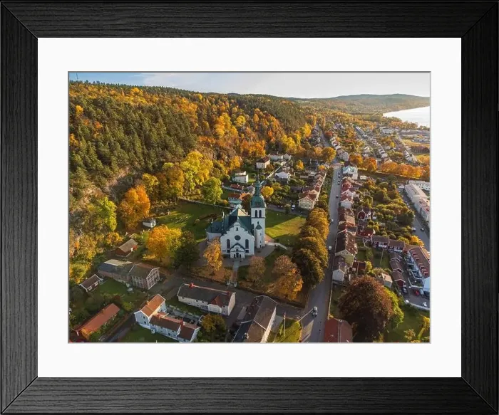 Framed Print : Gränna church in Sweden, autumn colors, at sunset, aerial view. Beautiful small swedish town Framed Print : Gränna church in Sweden, autumn colors, at sunset, aerial view. Beautiful small swedish town