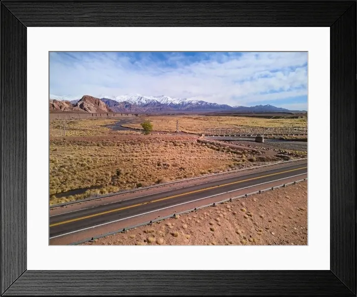 Framed Print : Asphalt road by the Andes mountains near Uspallata, Argentina Framed Print : Asphalt road by the Andes mountains near Uspallata, Argentina