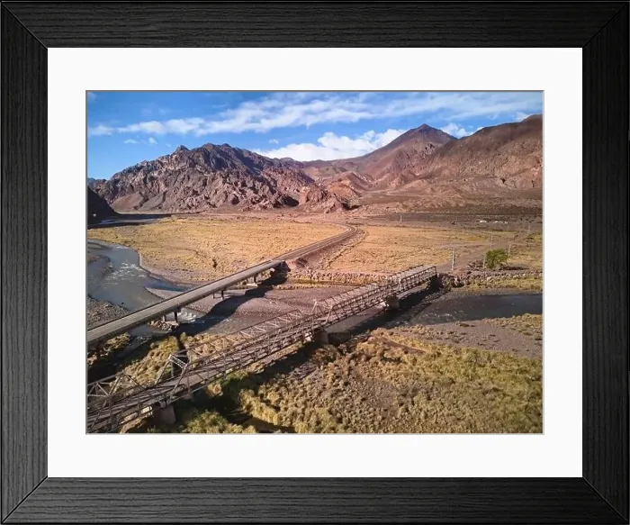 Framed Print : Bridge across Mendoza River by the Andes mountains near Uspallata, Argentina Framed Print : Bridge across Mendoza River by the Andes mountains near Uspallata, Argentina