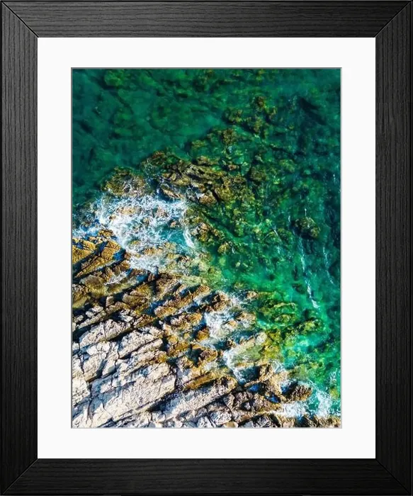 Framed Print : Aerial view of sharp rocks on Punta Planka, Croatia, splashed with waves creating white foam Framed Print : Aerial view of sharp rocks on Punta Planka, Croatia, splashed with waves creating white foam