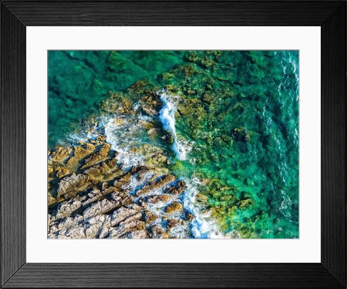 Framed Print : Aerial view of sharp rocks on Punta Planka, Croatia, splashed with waves creating white foam Framed Print : Aerial view of sharp rocks on Punta Planka, Croatia, splashed with waves creating white foam