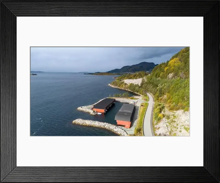 Framed Print : A scenic view of a tranquil Norwegian fjord surrounded by mountains and greenery Framed Print : A scenic view of a tranquil Norwegian fjord surrounded by mountains and greenery