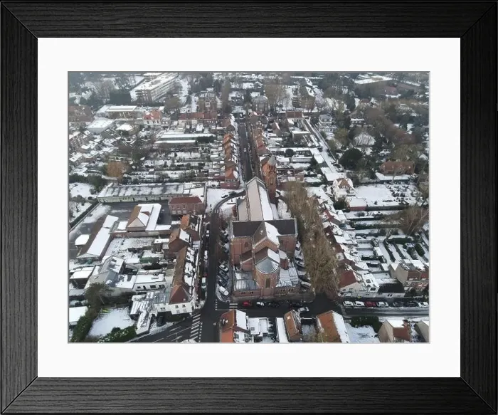 Framed Print : Church under the snow, architecture typical of northern France, with its red bricks Framed Print : Church under the snow, architecture typical of northern France, with its red bricks