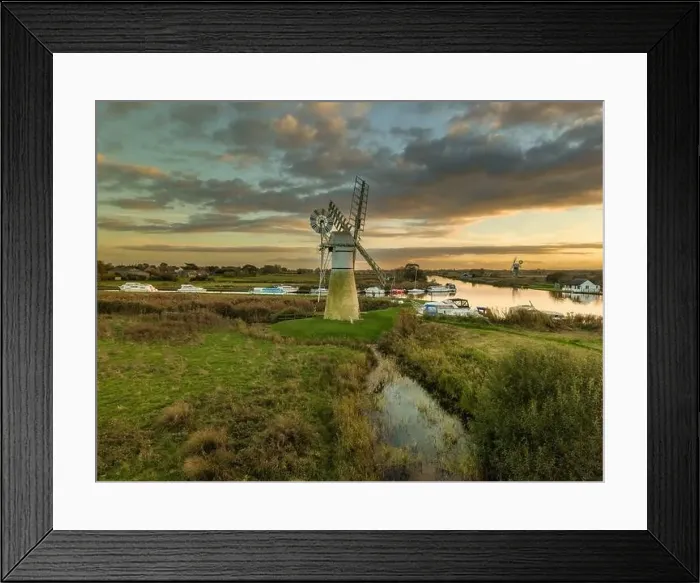 Framed Print : A serene shot of the historic Thurne Windmill in Norfolk, UK, captured at sunset Framed Print : A serene shot of the historic Thurne Windmill in Norfolk, UK, captured at sunset