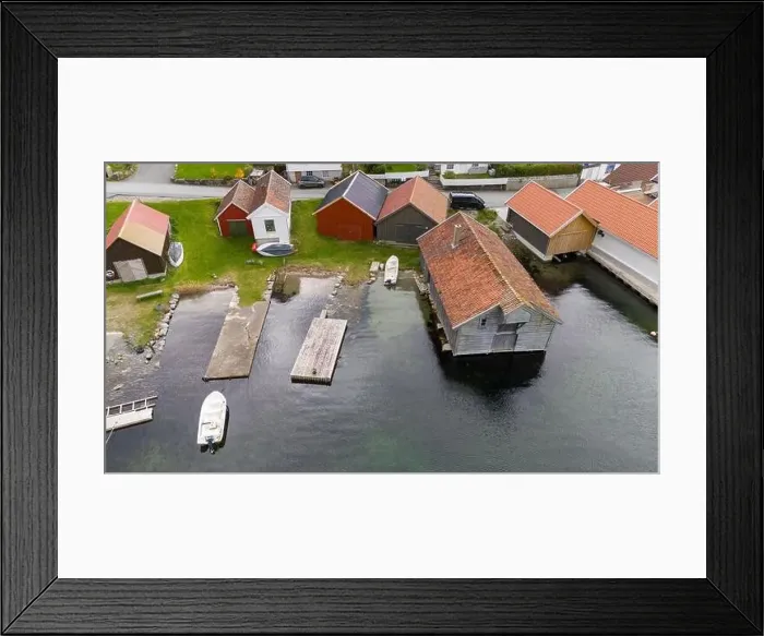 Framed Print : Aerial view of a small coastal village featuring a harbor Framed Print : Aerial view of a small coastal village featuring a harbor