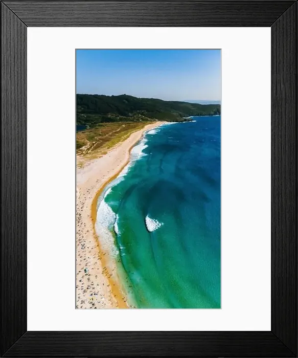 Framed Print : Aerial shot capturing a vibrant beach scene along the coast of Galicia Framed Print : Aerial shot capturing a vibrant beach scene along the coast of Galicia