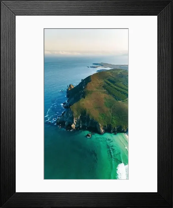 Framed Print : A breathtaking drone shot capturing the vibrant and lush green coastline of Galicia Framed Print : A breathtaking drone shot capturing the vibrant and lush green coastline of Galicia