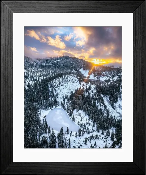 Framed Print : The Cascade Range in Washington State dusted with fresh snow captured by drone with orange clouds in the sky Framed Print : The Cascade Range in Washington State dusted with fresh snow captured by drone with orange clouds in the sky
