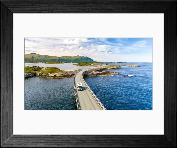 Framed Print : An RV drives along the Atlantic Road Bridge in Norway, a scenic bridge that connects several islands Framed Print : An RV drives along the Atlantic Road Bridge in Norway, a scenic bridge that connects several islands