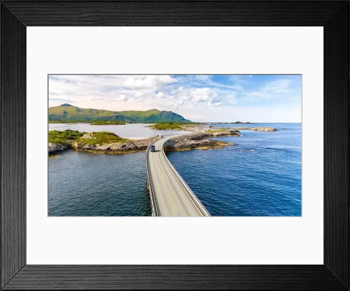 Framed Print : An aerial view of the Atlantic Road in Norway, showcasing its iconic bridge curving through the ocean Framed Print : An aerial view of the Atlantic Road in Norway, showcasing its iconic bridge curving through the ocean