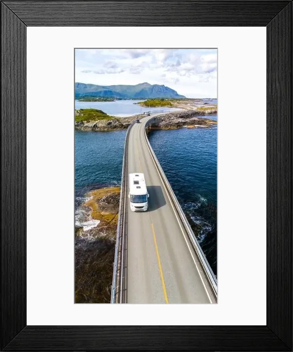 Framed Print : An RV drives along the scenic Atlantic Ocean Road in Norway
