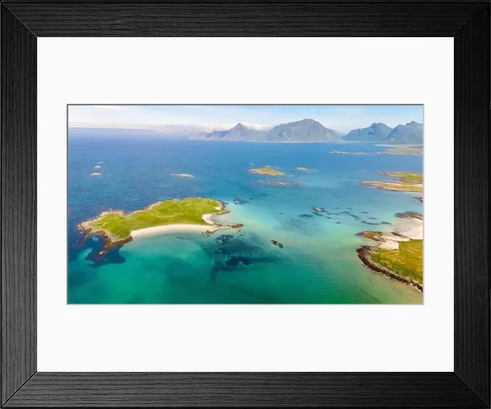 Framed Print : An aerial view of a small island with a pristine sandy beach Framed Print : An aerial view of a small island with a pristine sandy beach