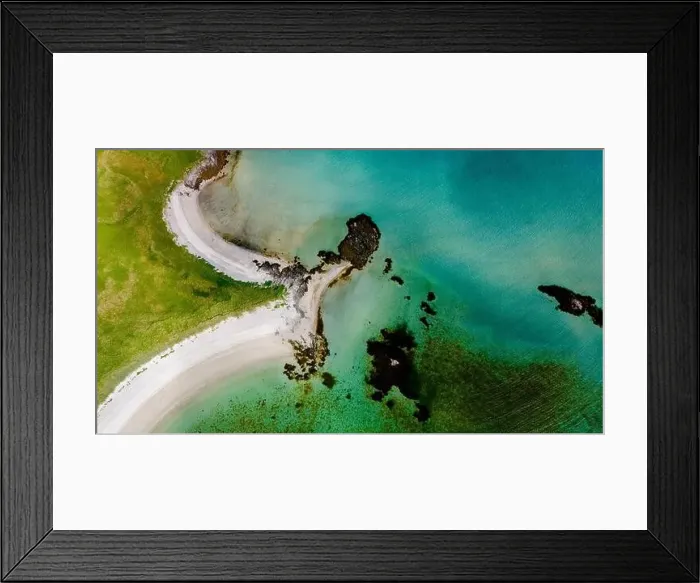 Framed Print : An aerial view of a sandy beach curving into turquoise waters Framed Print : An aerial view of a sandy beach curving into turquoise waters