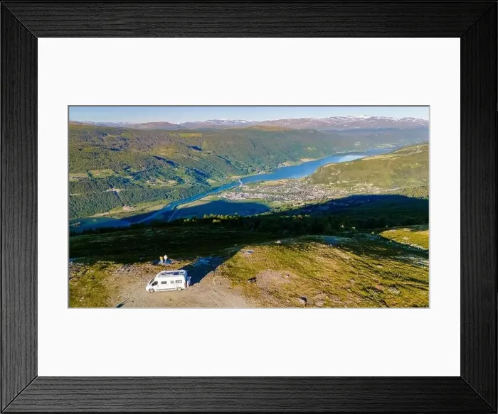 Framed Print : A white campervan parked on a grassy hillside overlooking a stunning Norwegian fjord. Grimsdalen Norway