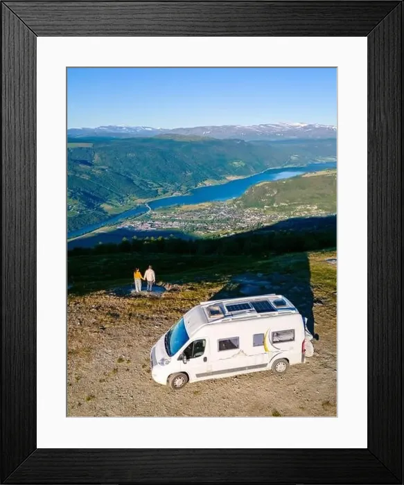 Framed Print : A couple enjoys the view of a Norwegian fjord from their campervan Framed Print : A couple enjoys the view of a Norwegian fjord from their campervan