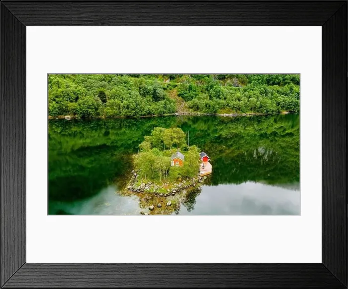 Framed Print : small, green island with two red cabins nestled amongst trees in a secluded Norwegian fjord Framed Print : small, green island with two red cabins nestled amongst trees in a secluded Norwegian fjord