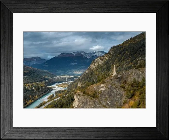 Framed Print : A view of the Rhine River in the Domleschg Valley and the Hochjuvalt fortress in autumn Framed Print : A view of the Rhine River in the Domleschg Valley and the Hochjuvalt fortress in autumn